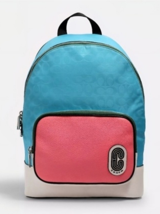 Coach Handbags - Coach. Signature Nylon Backpack in vibrant Blue and Pink. GUC.